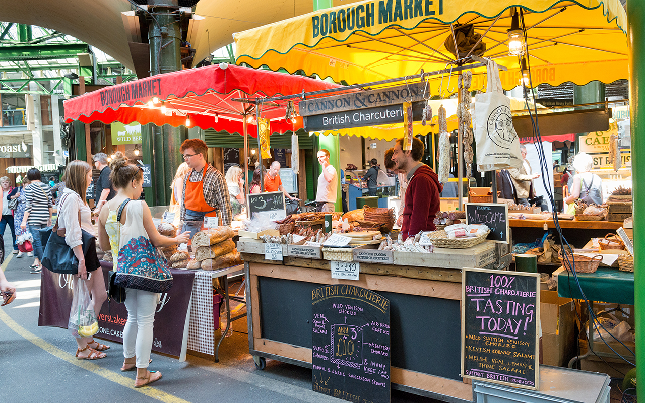 LONDON, ENGLAND, UK - JUNE 6, 2013: Specialty food stalls at Borough Market in London